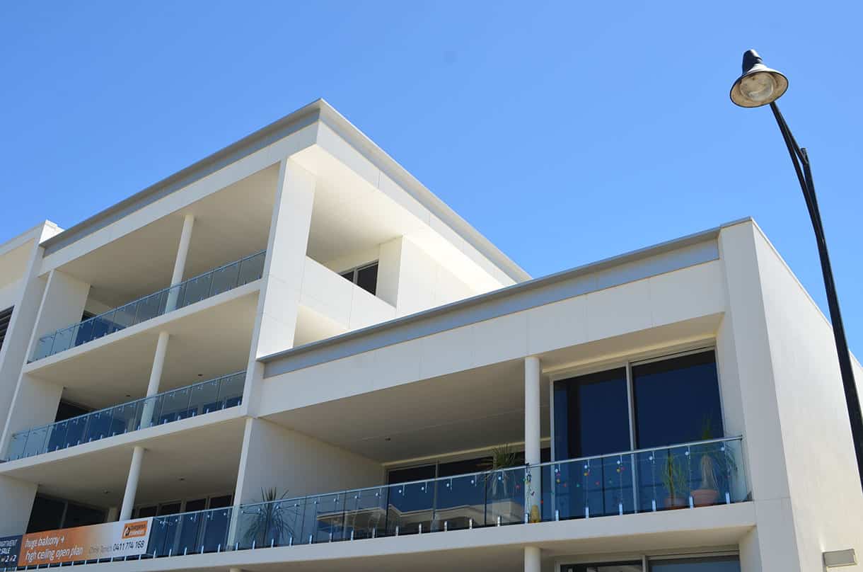 INNOVA Duralux fibre cement soffit and wall lining used on modern apartment façade
