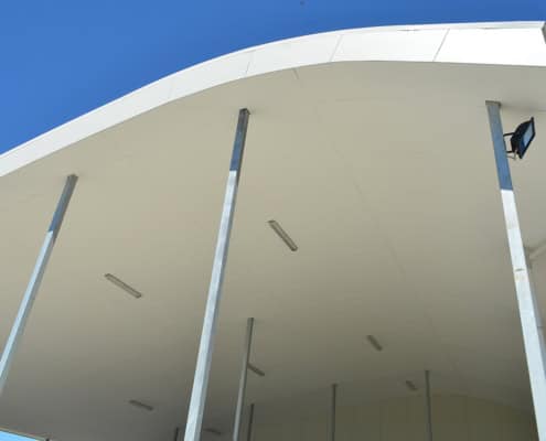 INNOVA Duralux fibre cement soffit lining installed on curved roof structure