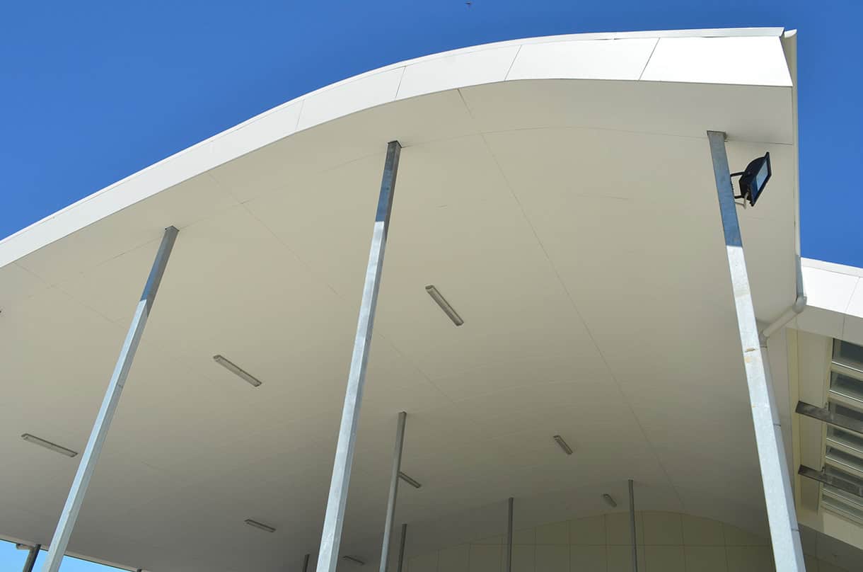 INNOVA Duralux fibre cement soffit lining installed on curved roof structure
