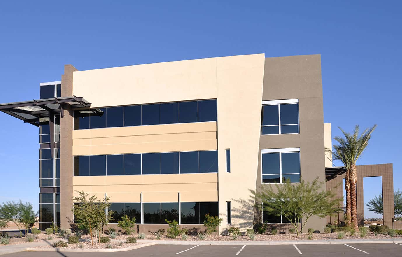 Commercial building façade finished with Innova Duratex fibre cement cladding and textured coating