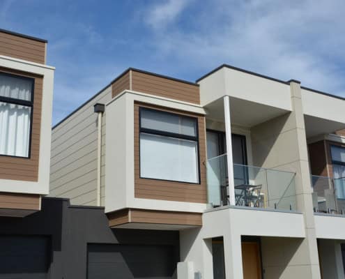 Modern townhouse featuring Innova Duratex fibre cement cladding with rendered finish