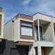 Modern townhouse featuring Innova Duratex fibre cement cladding with rendered finish
